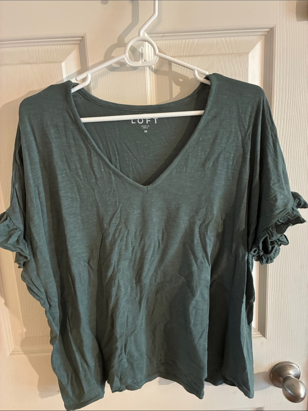 Beautiful green loft top with ruffle short sleeves size medium
